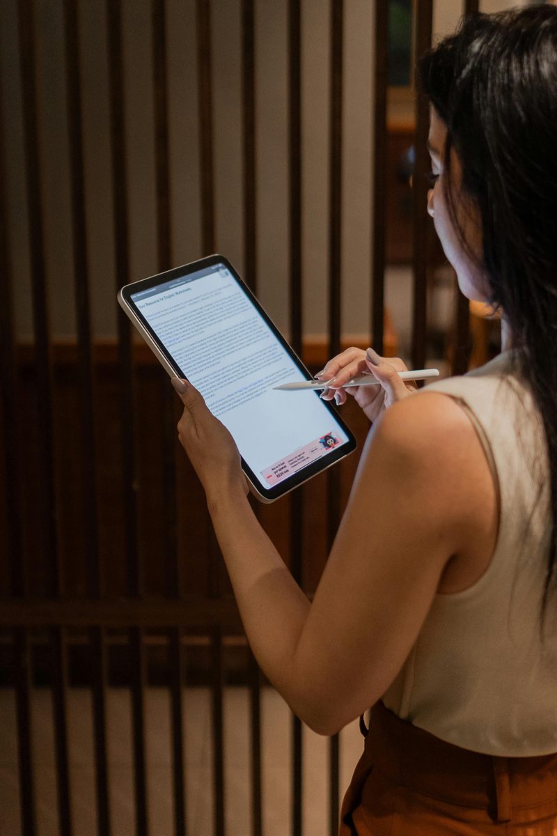 Person reviewing AI governance documents on tablet